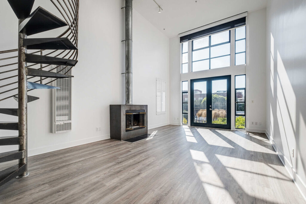 Main living area with skylights and fireplace